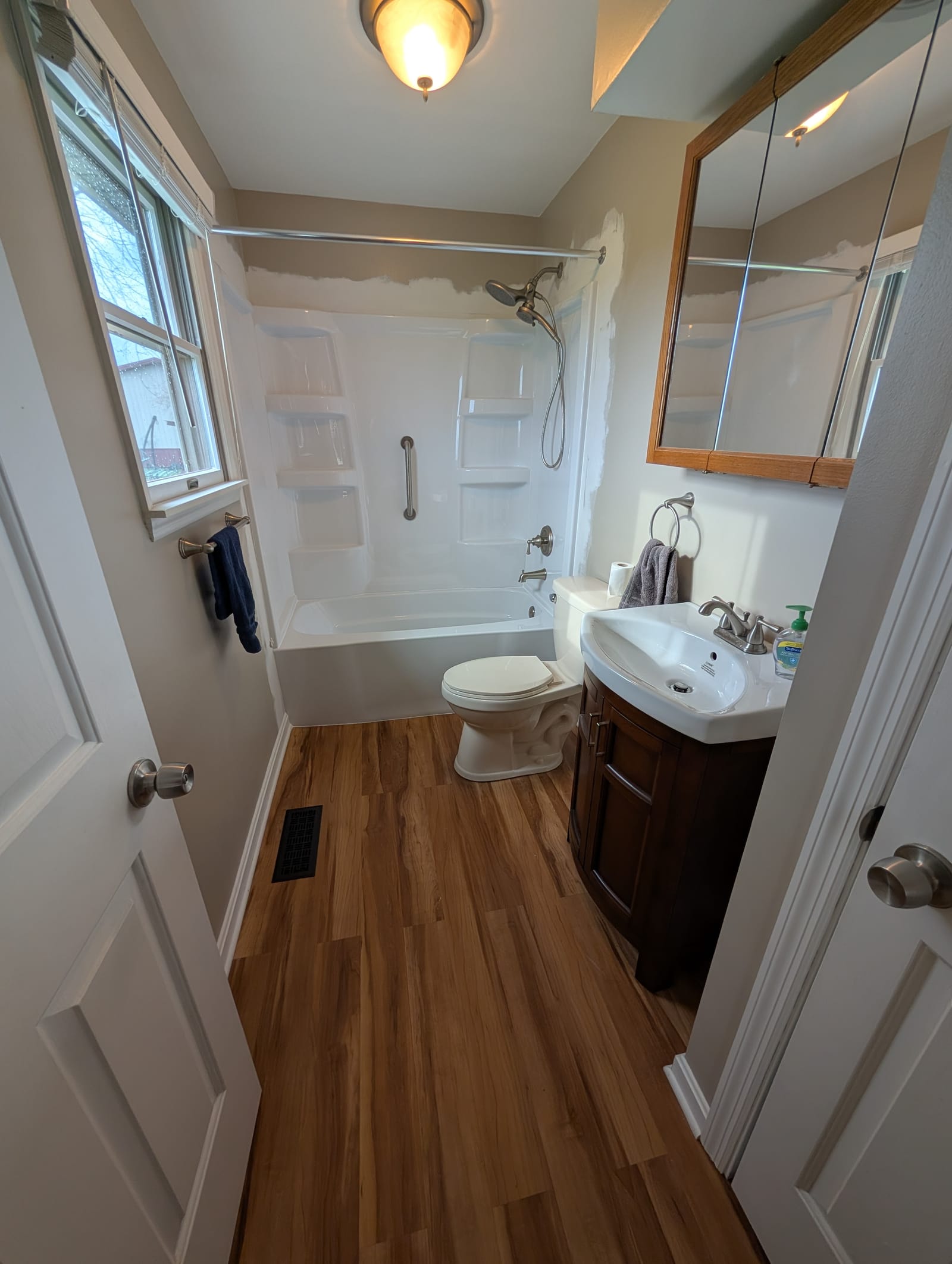 Complete bathroom remodel with new plumbing fixtures